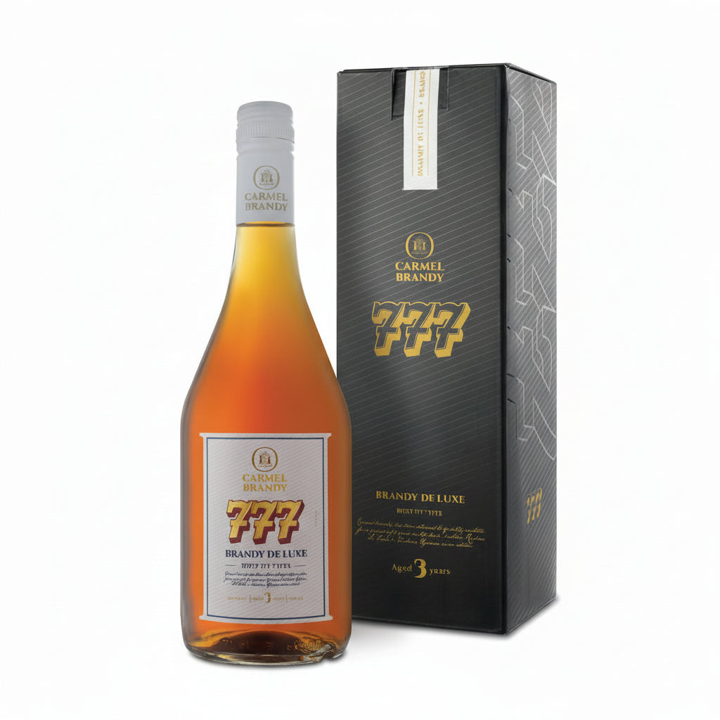 Carmel Brandy 777 bottle with packaging on a white background Israeli wine