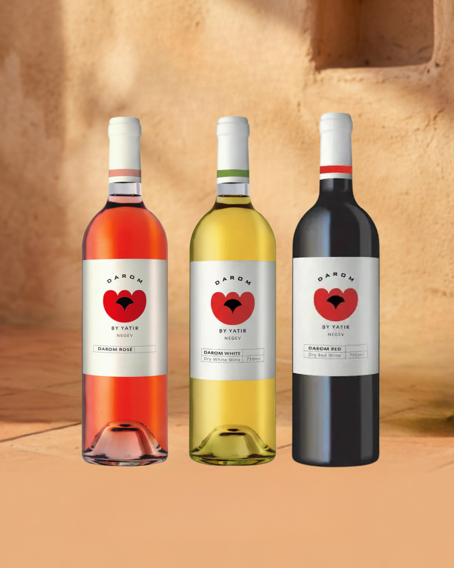 Three wine bottles with Daron labels on a beige background