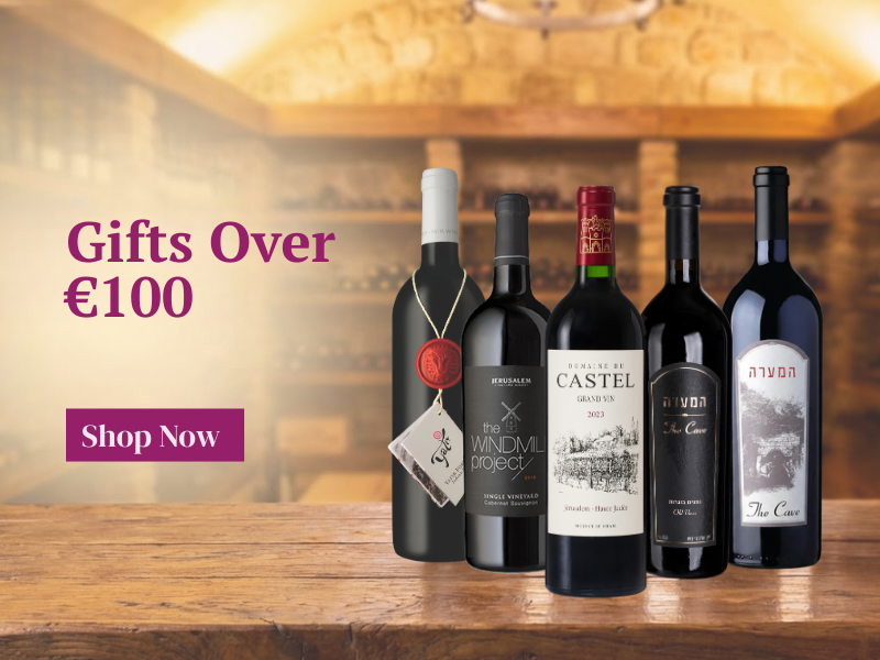 Five wine bottles on a wooden table with a blurred background and promotional text.