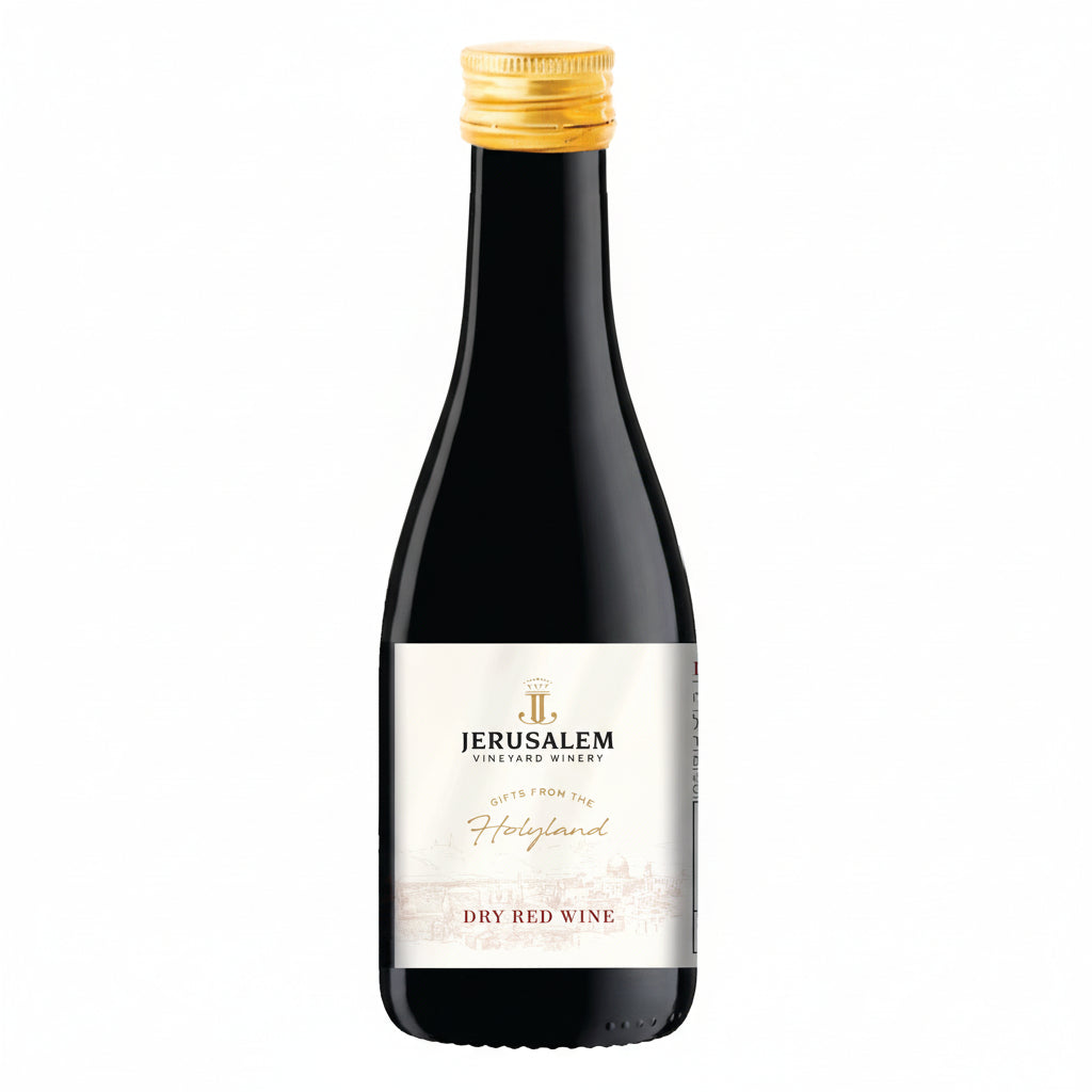 Bottle of Jerusalem Vineyard Winery Holyland Dry Red wine with a gold foil cap Israeli wine