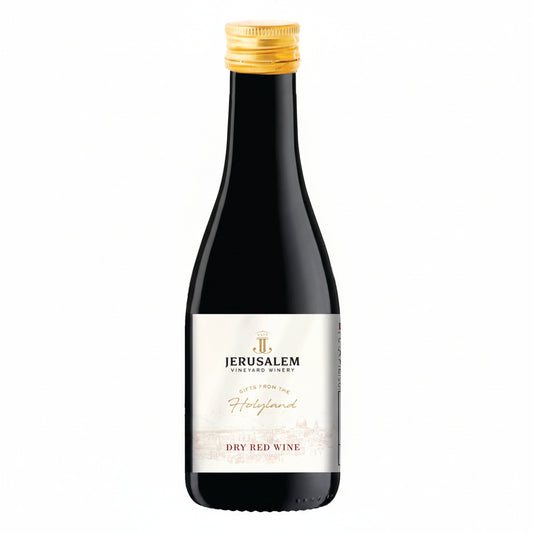 Bottle of Jerusalem Vineyard Winery Holyland Dry Red wine with a gold foil cap Israeli wine