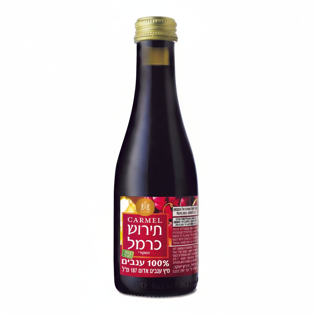 Bottle of Carmel Tirosh juice with a colorful label on a white background 187ml