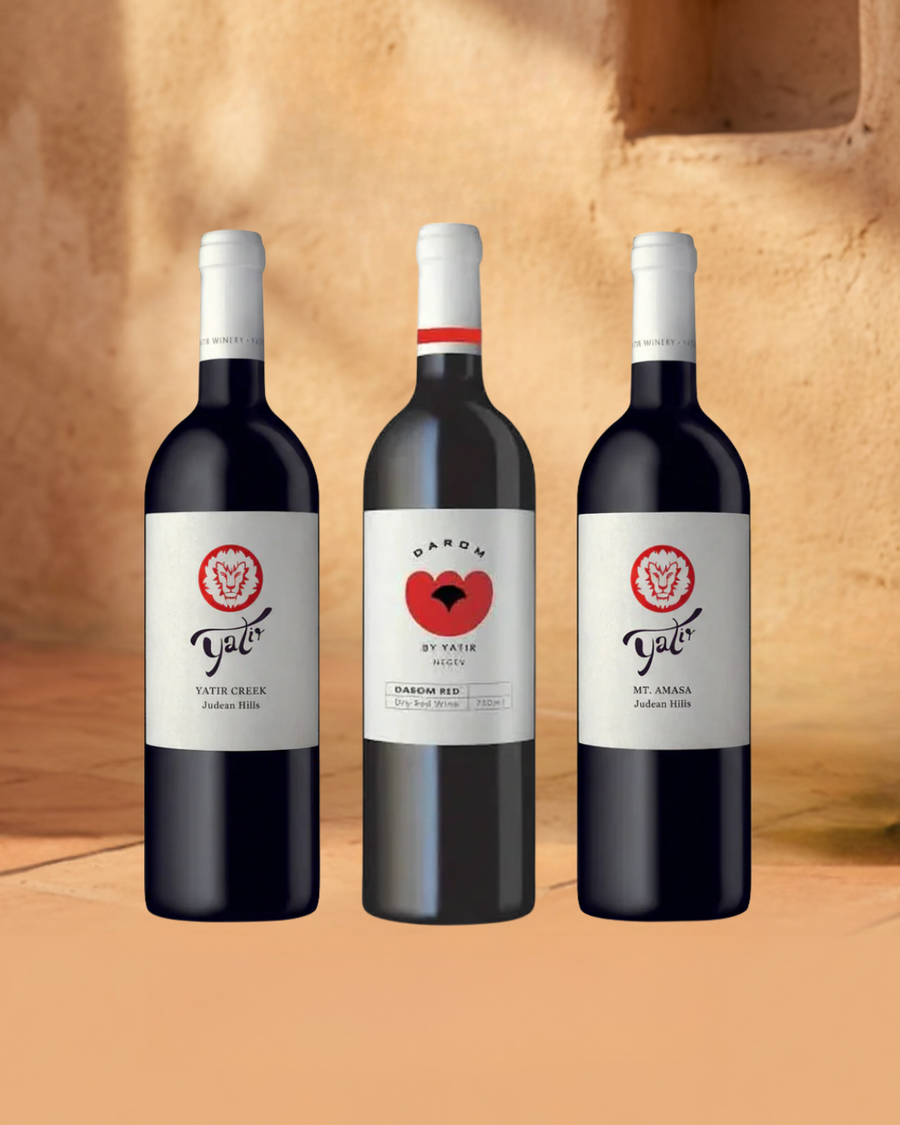 Three bottles of wine with labels on a wooden surface Yatir MT Amasa Creek, Darom